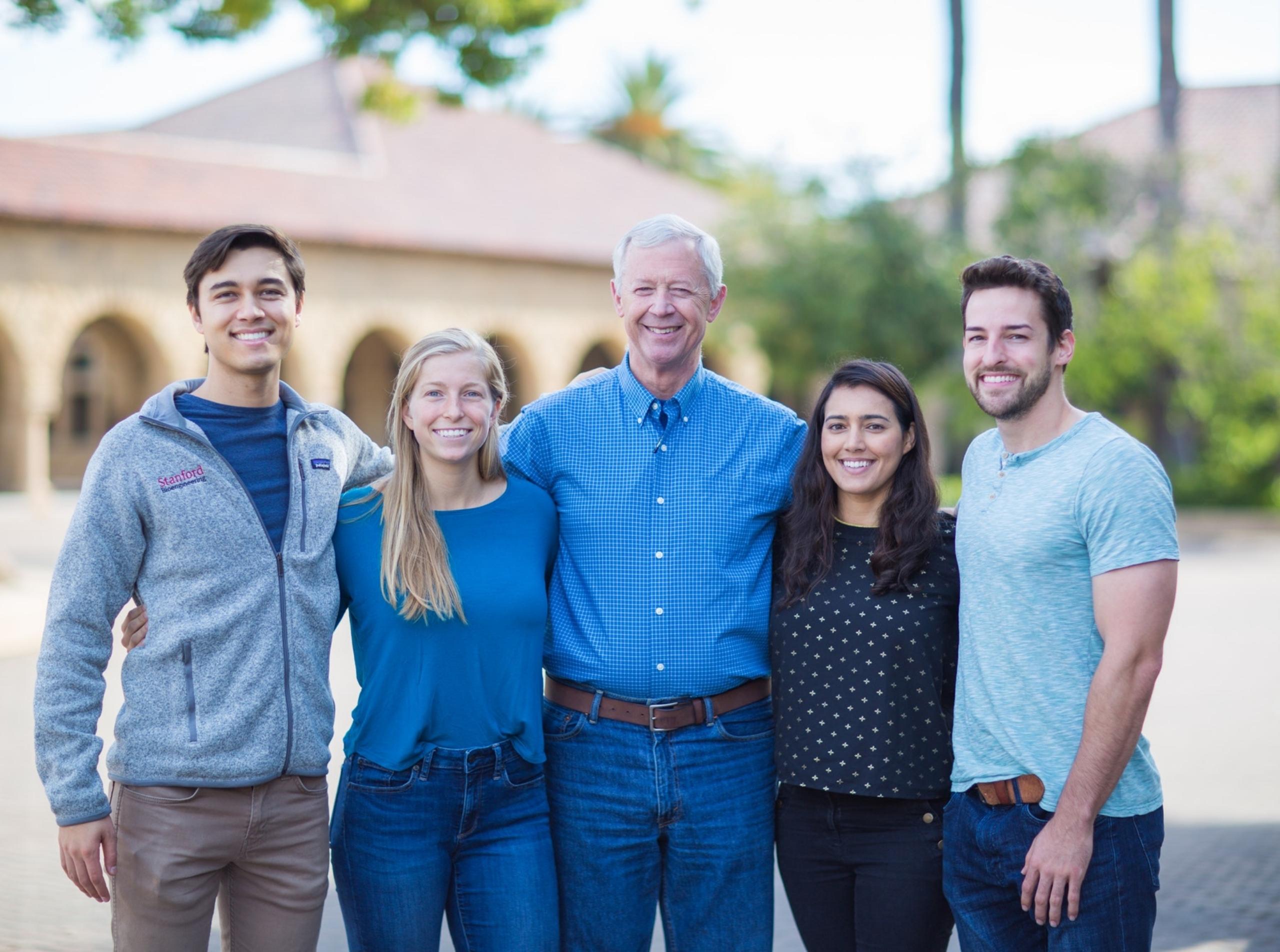 Photo of DCI Fellow Mark Clapper (Class of 2018) with four students