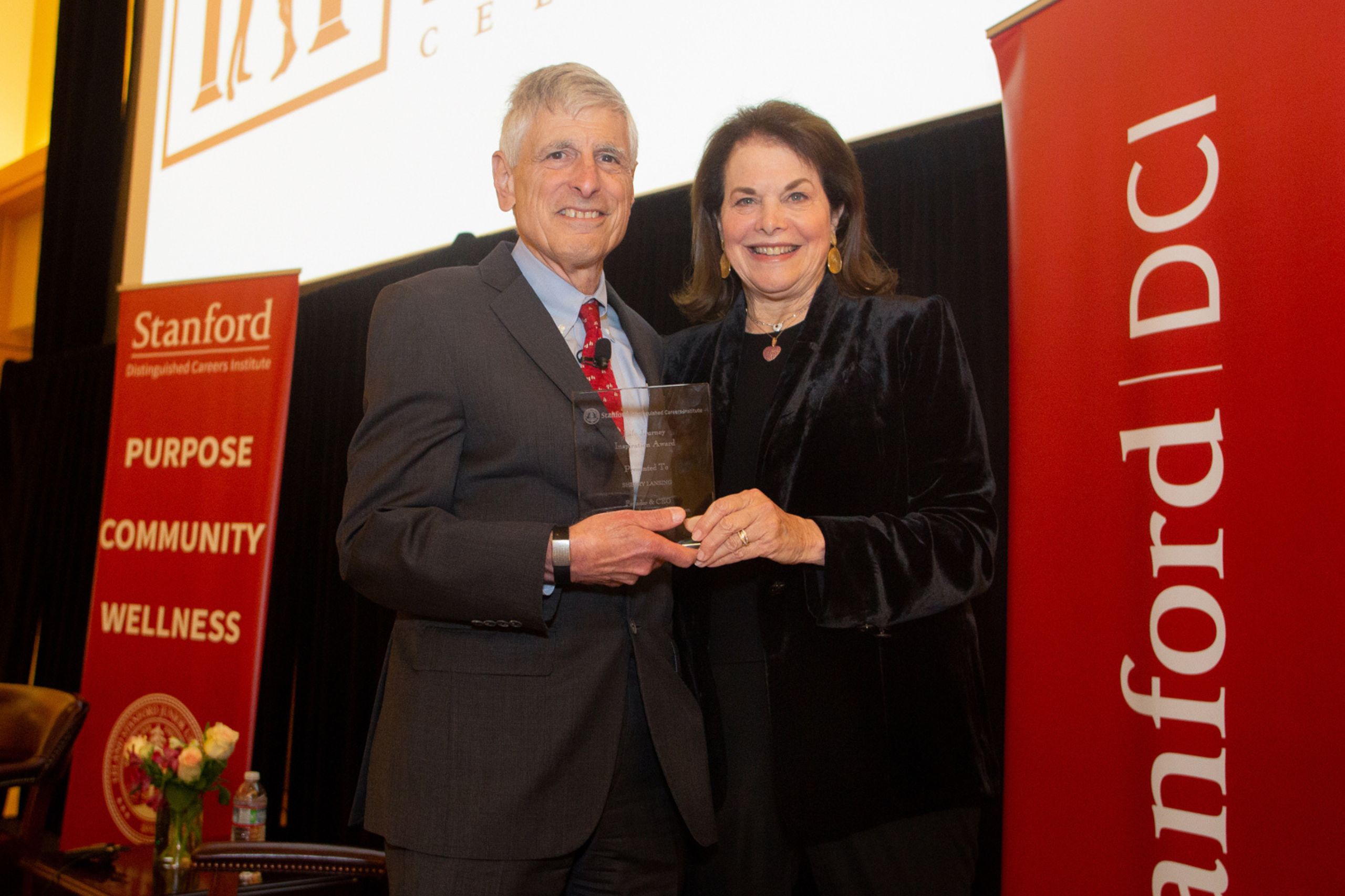 Sherry Lansing (right) Receiving Life Journey Transformation award from Phil Pizzo (left)