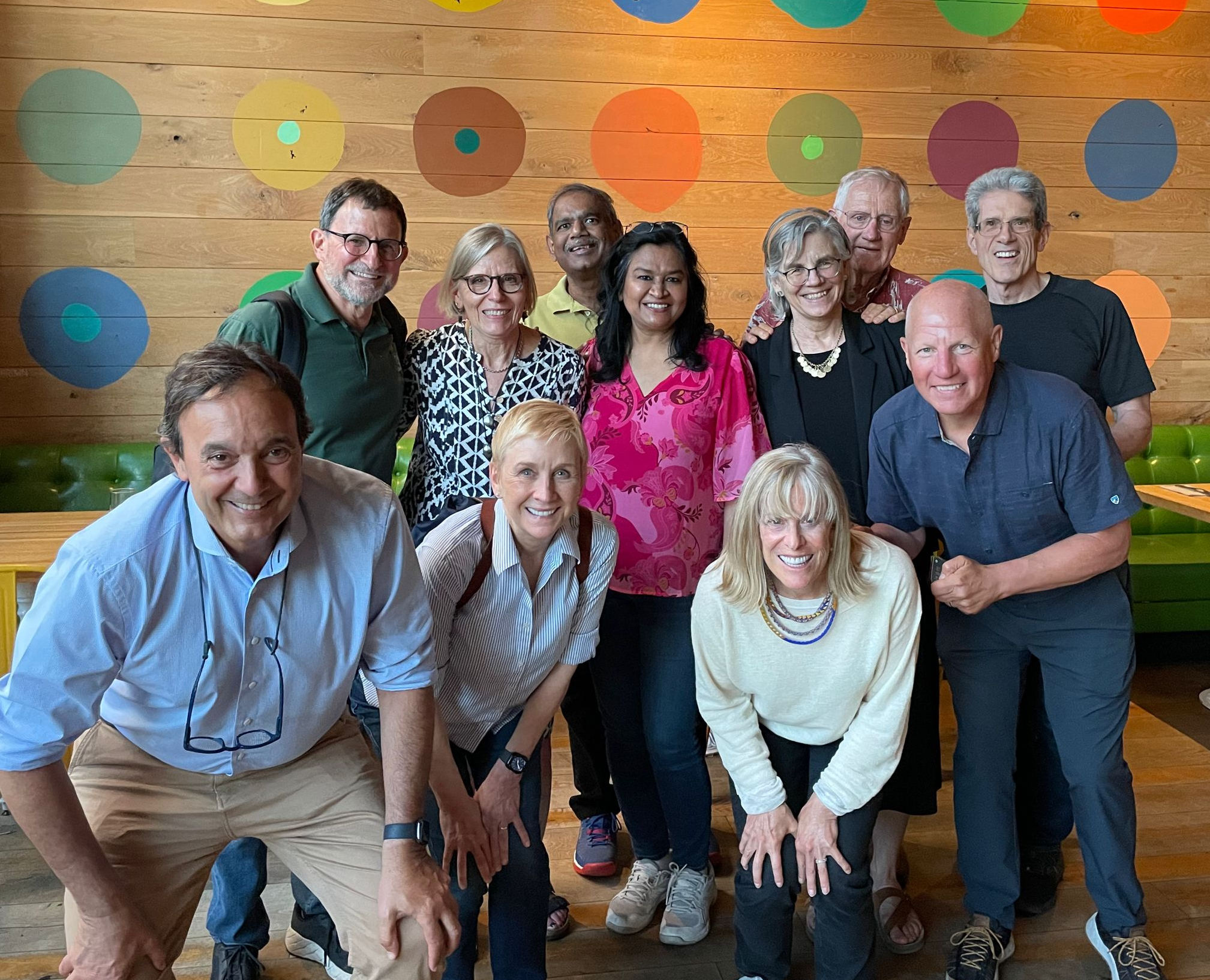 DCI 2019 Fellows. Background wall with colorful circles.