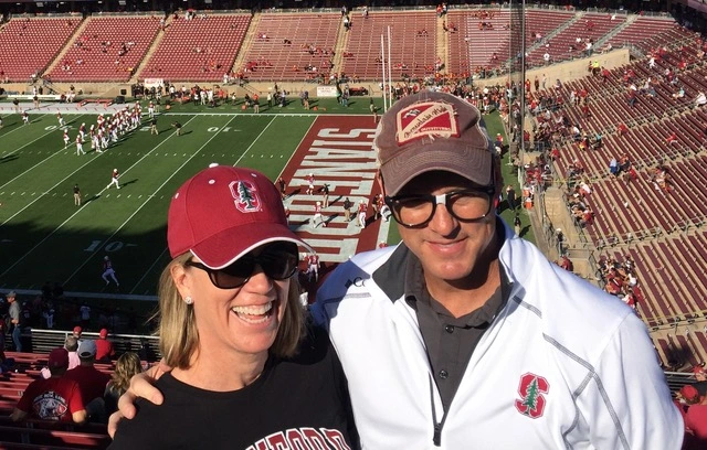 Kathy and David Payne (DCI 2019) at Stanford football game.