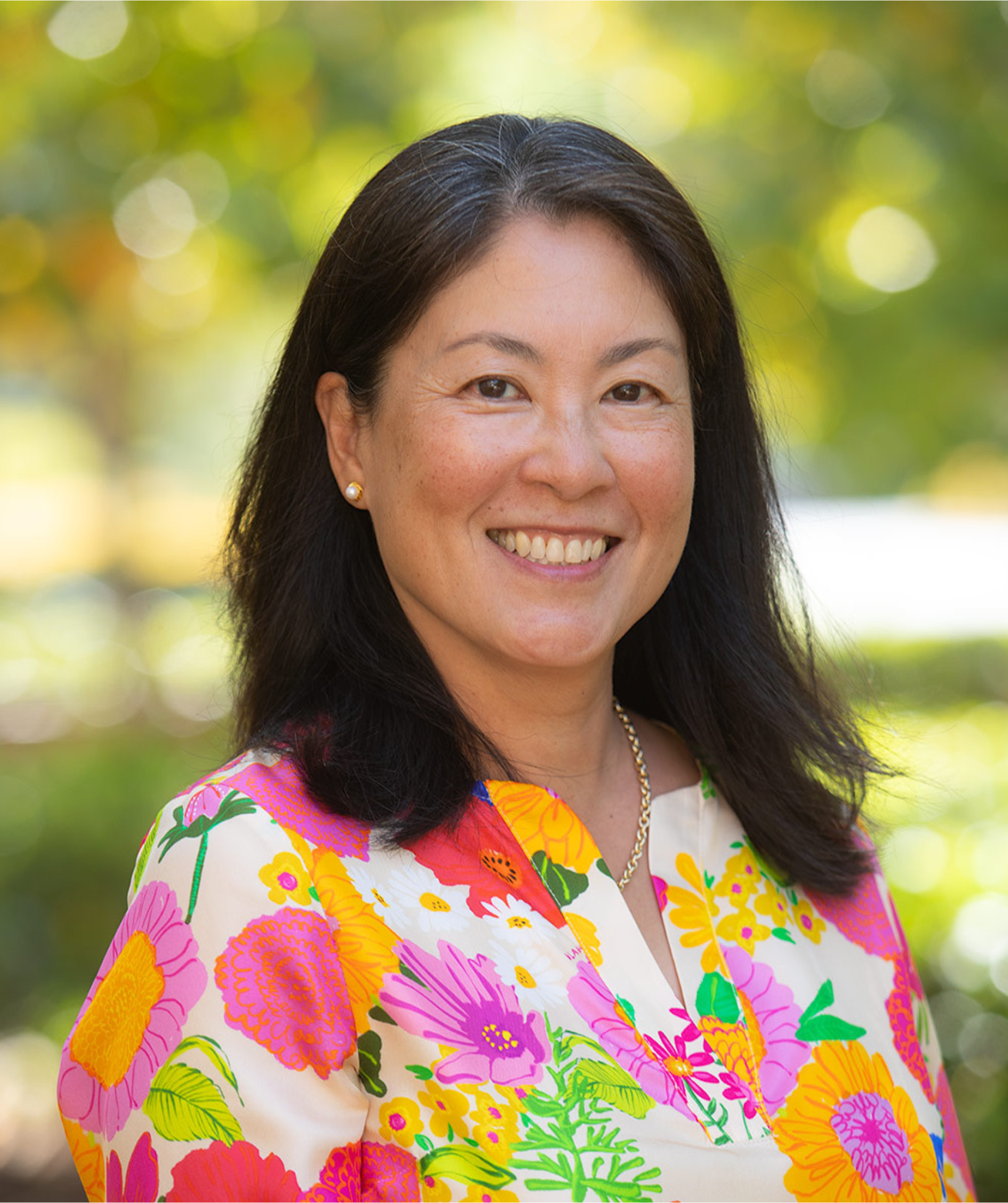 Elise Maar Headshot of Elise Marr wearing colorful dress