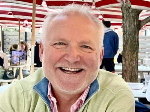 Terry Schallich, DCI Fellow 2026 seated in a cafe.